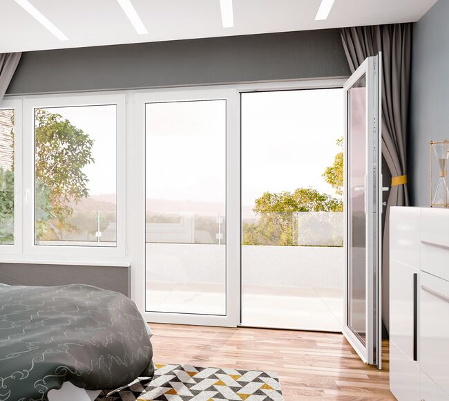 Bild Bunter Schlafzimmer mit weiße Balkontür mit flacher Schwelle und Fenster Iglo 5 Classic aus Kunststoff