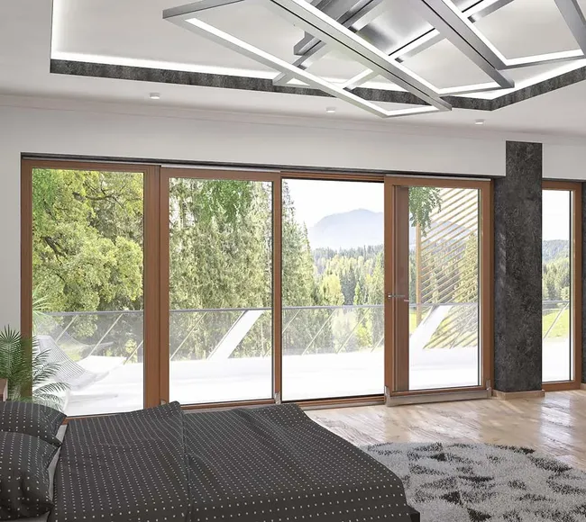Bild Großer Schlafzimmer mit  Balkonschiebetür in Holzdekor und Ausgang zu Terrasse mit Glasbarriere