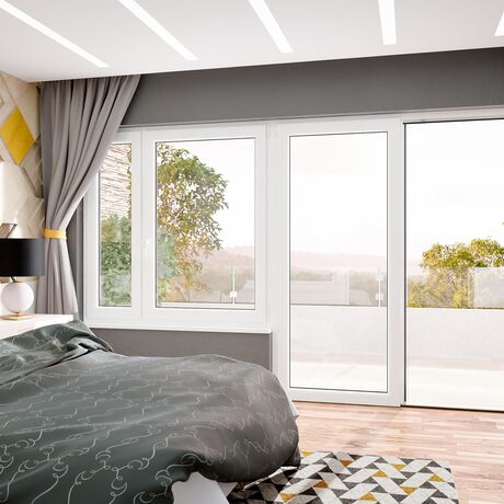 Bild Großer bunter Schlafzimmer mit Doppelbett und  weißen Balkontür und Fenster in Iglo 5 Classic Kunststoff Systeme