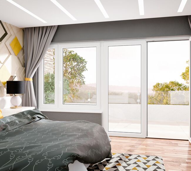 Bild Großer bunter Schlafzimmer mit Doppelbett und  weißen Balkontür und Fenster in Iglo 5 Classic Kunststoff Systeme